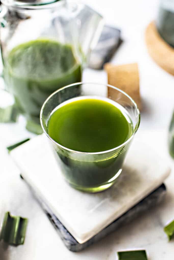 Green pandan juice in a glass jar for agar jelly.