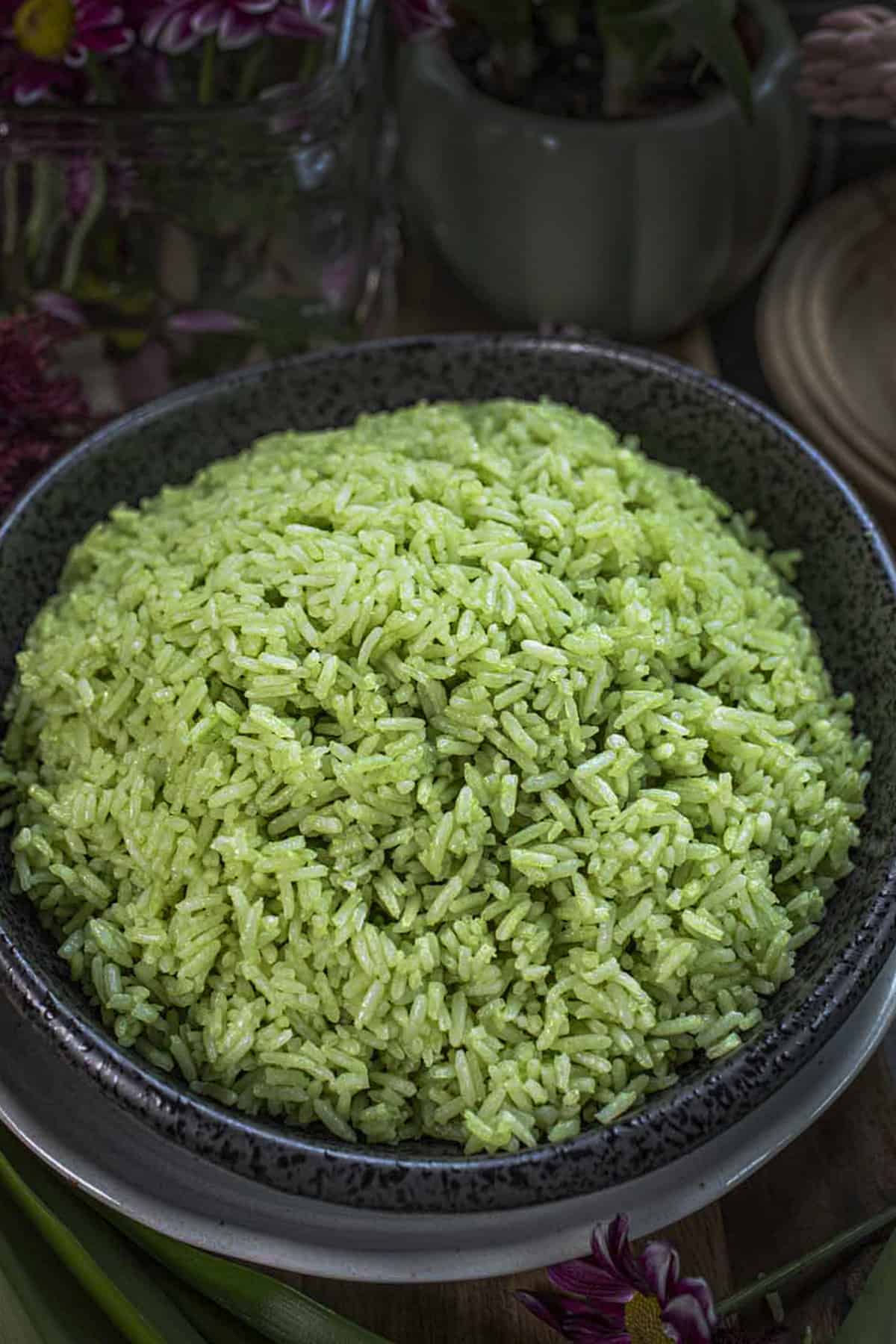 Pandan coconut jasmine rice in a black bowl.