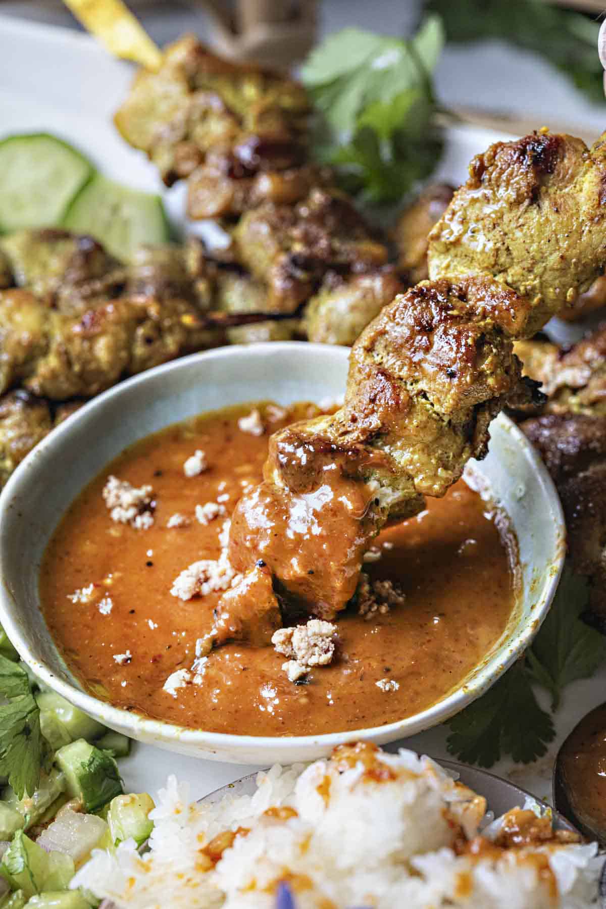 Thai Pork satay with peanut dipping sauce. 