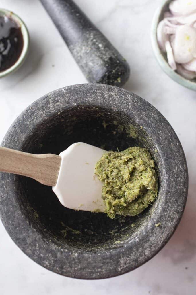 Hai Yai chicken paste in a mortar and pestle. 