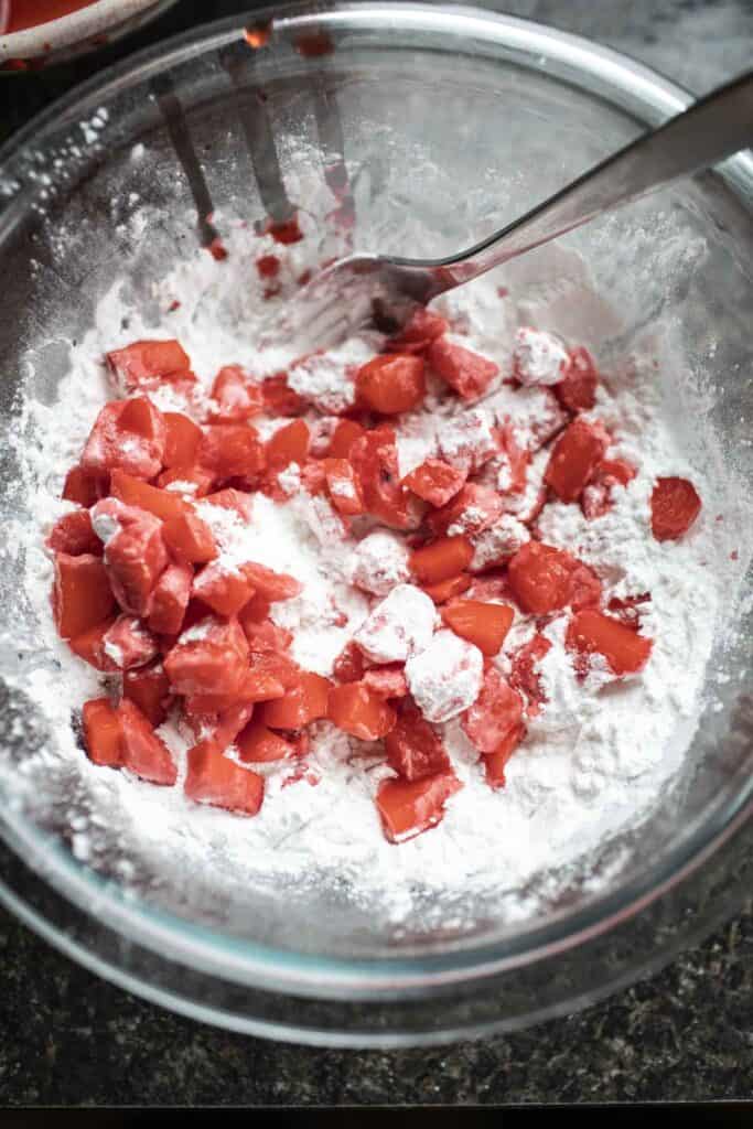 Red waterchestnuts pearls in a bowl with tapioca pearls. 