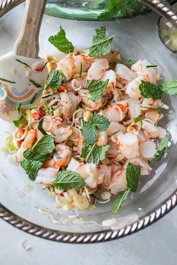 thai lemongrass salad with shrimp in a bowl. 