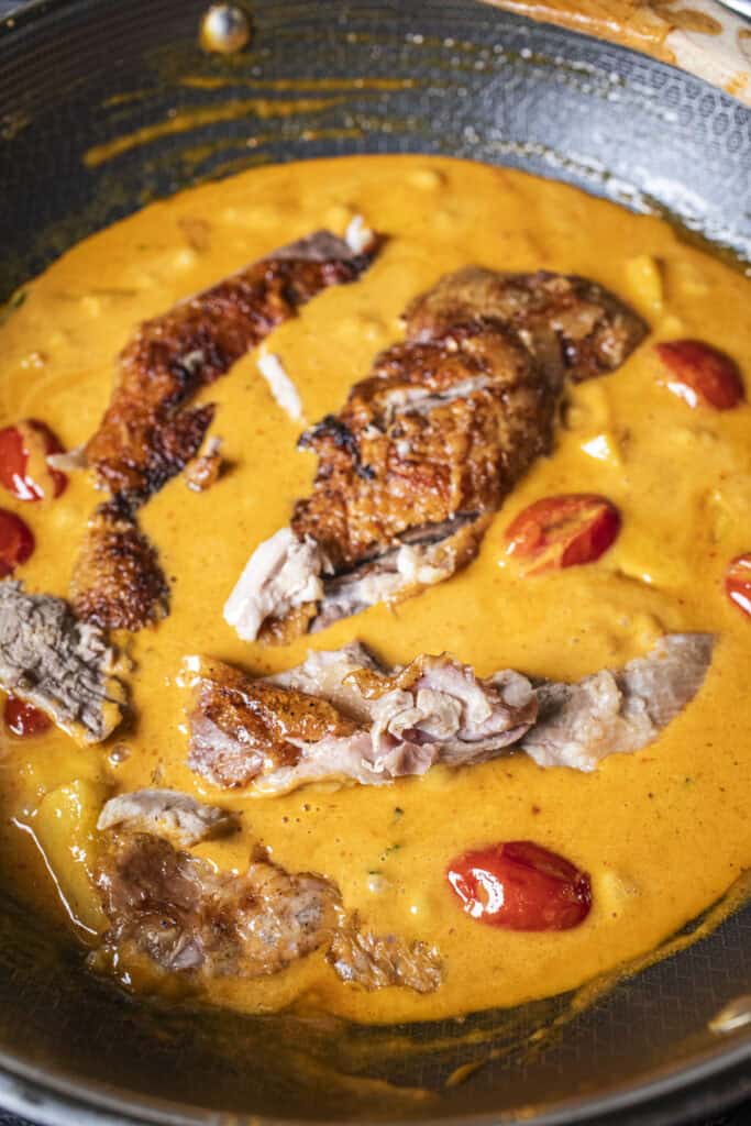 Roasted duck in a curry sauce.