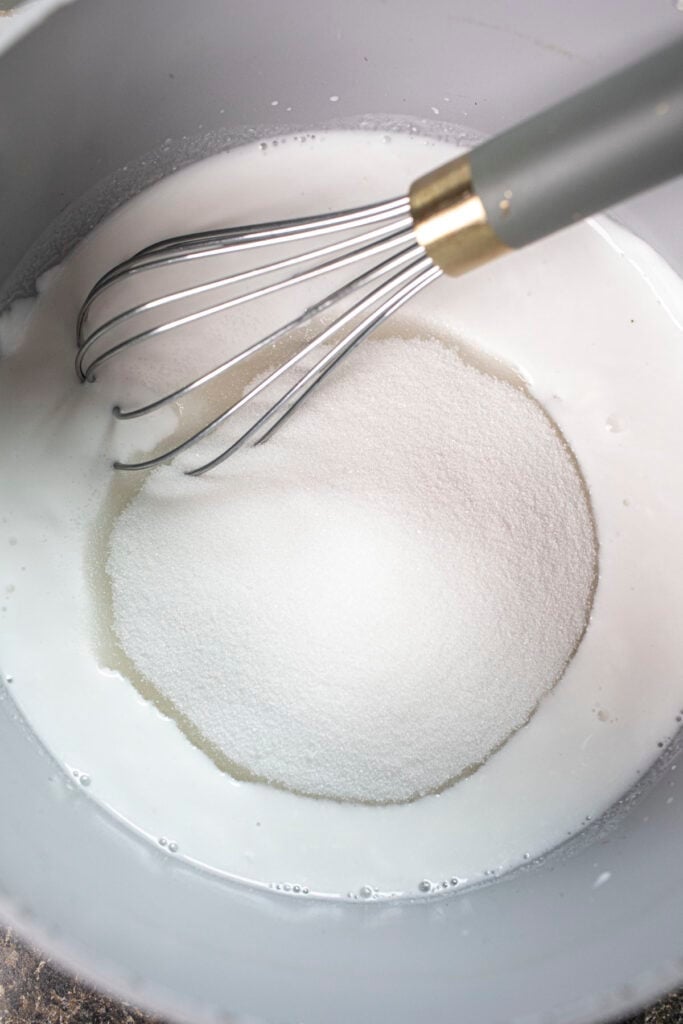 sugar and coconut milk in a sauce pan. 