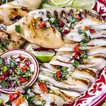 Thai grilled squid on a tray.