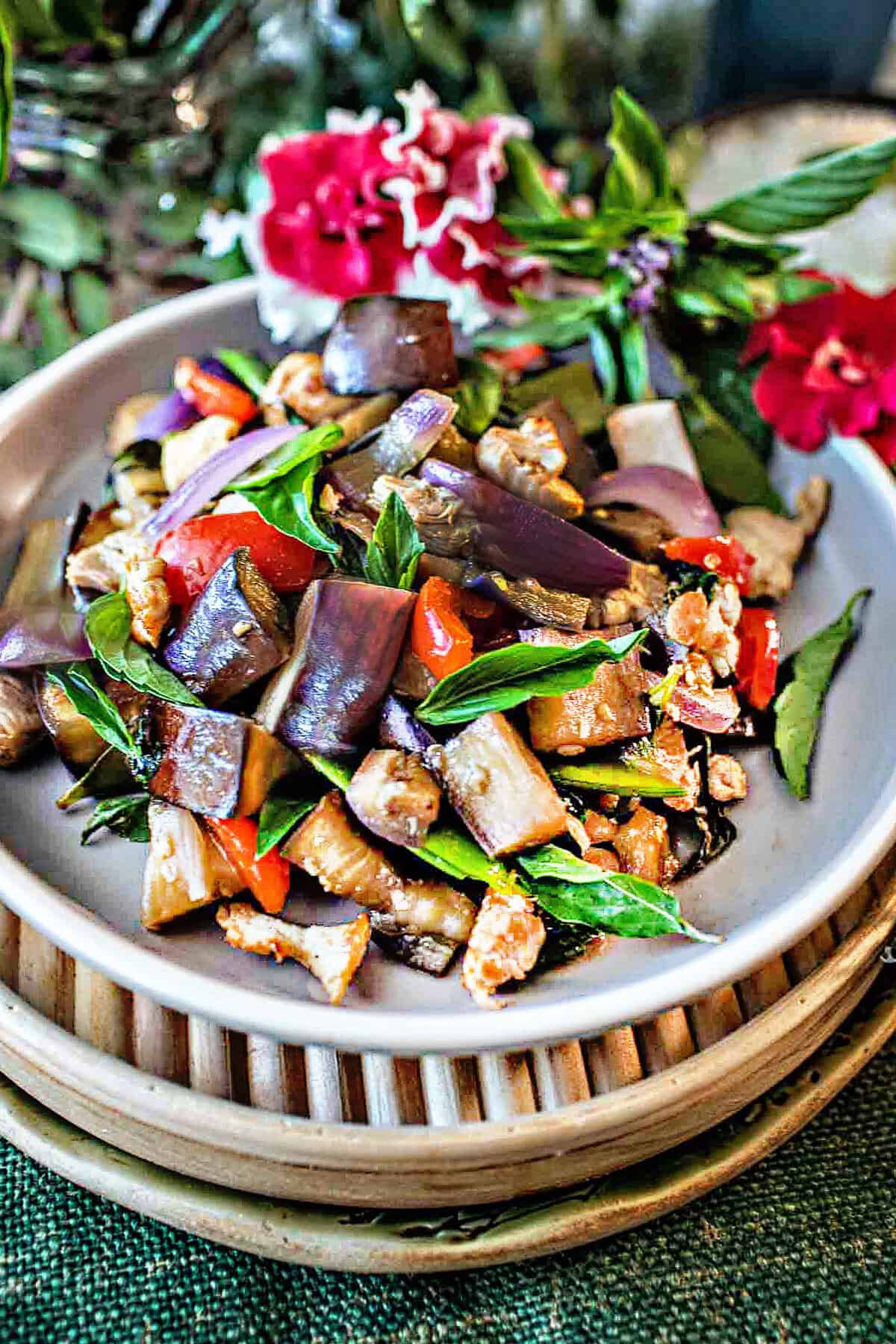 Chinese Eggplant Stir fry on a round plate. 