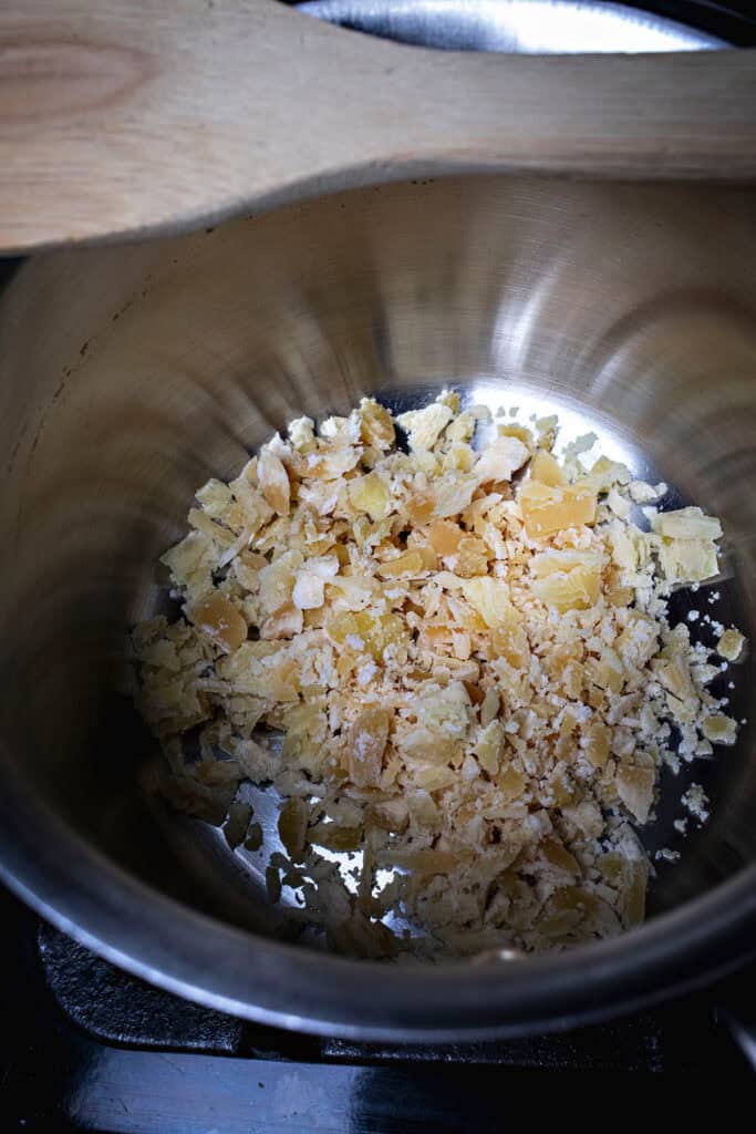 Palm sugar in pad thai sauce in a sauce pan.