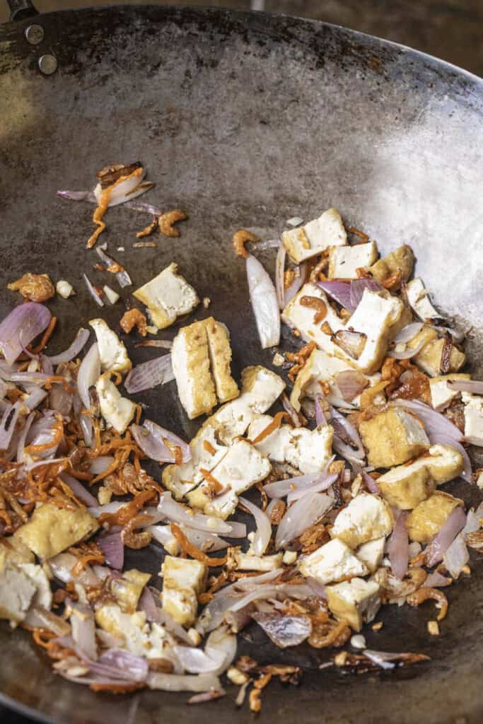 fried Aromatics for pad thai in a wok. 