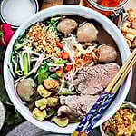 Thai boat noodles in a bowl.
