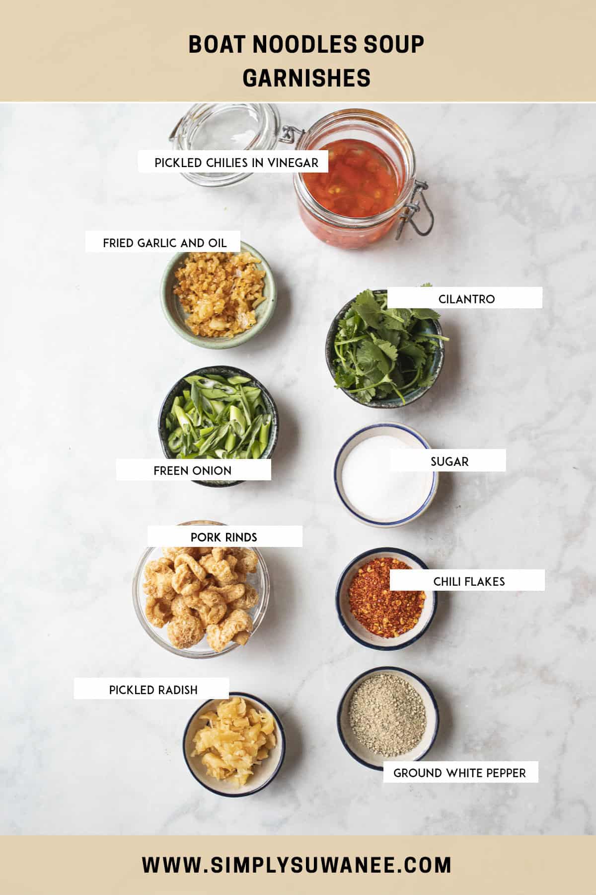 Labeled ingredients for garnishes for boat noodles recipe on a counter.