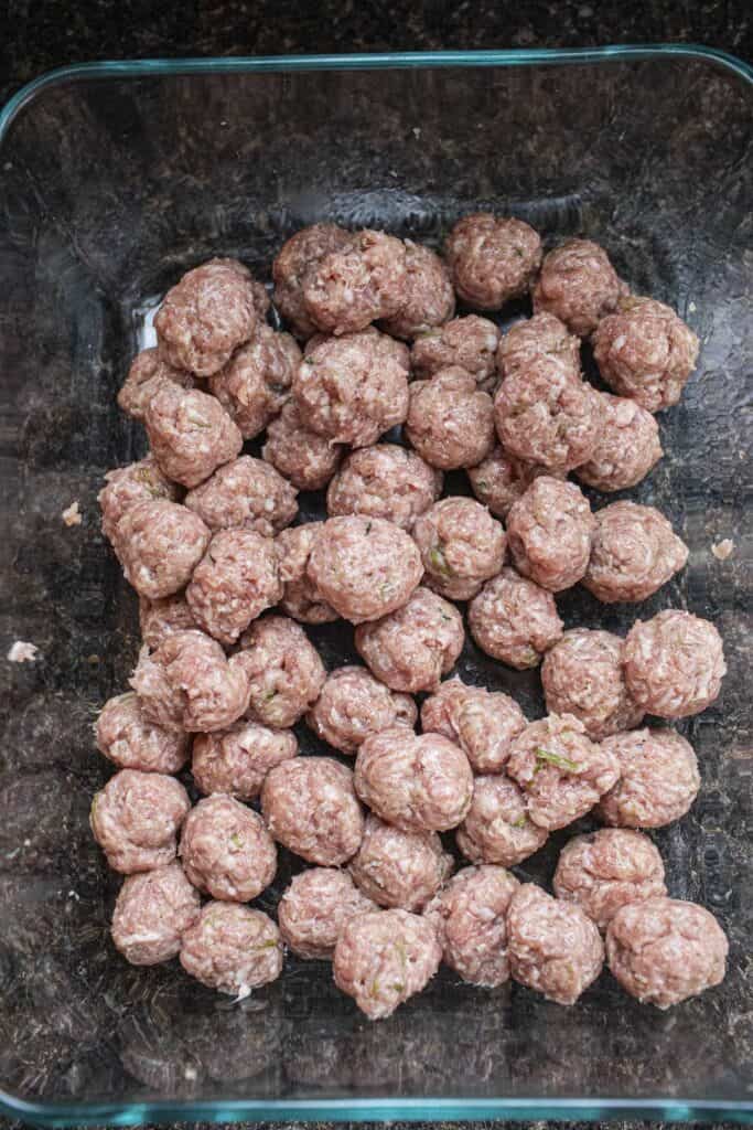 Pork meatballs in a glass container 