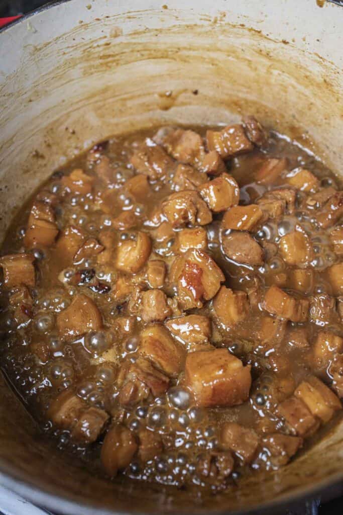 Pork belly stew in a dutch oven.