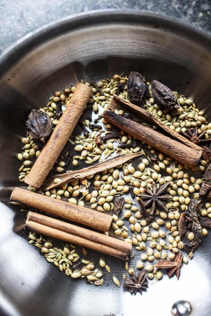 Toasted spices in a pan.