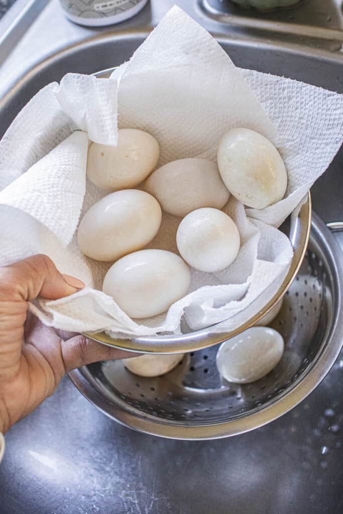 Clean Fresh duck eggs in a bowl over the sink.