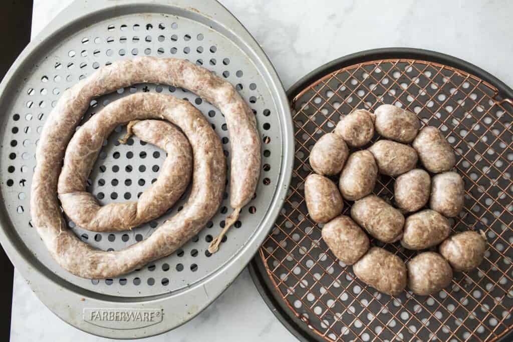  krok isan sausages links on trays. 