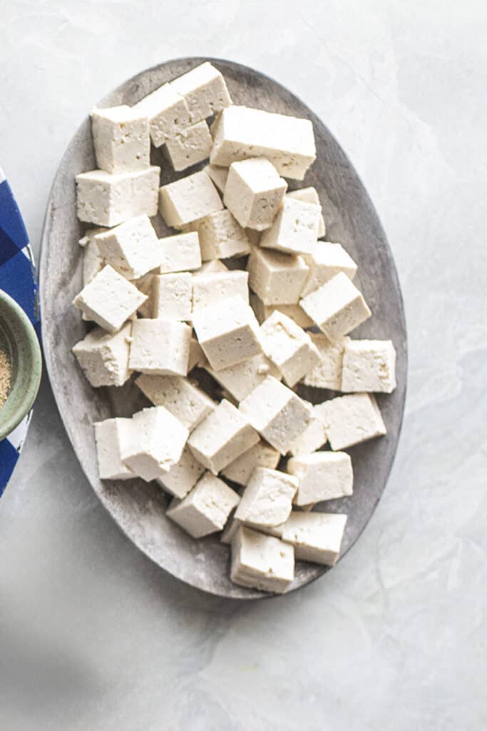 cubed tofu for salt and pepper recipe on a plate. 