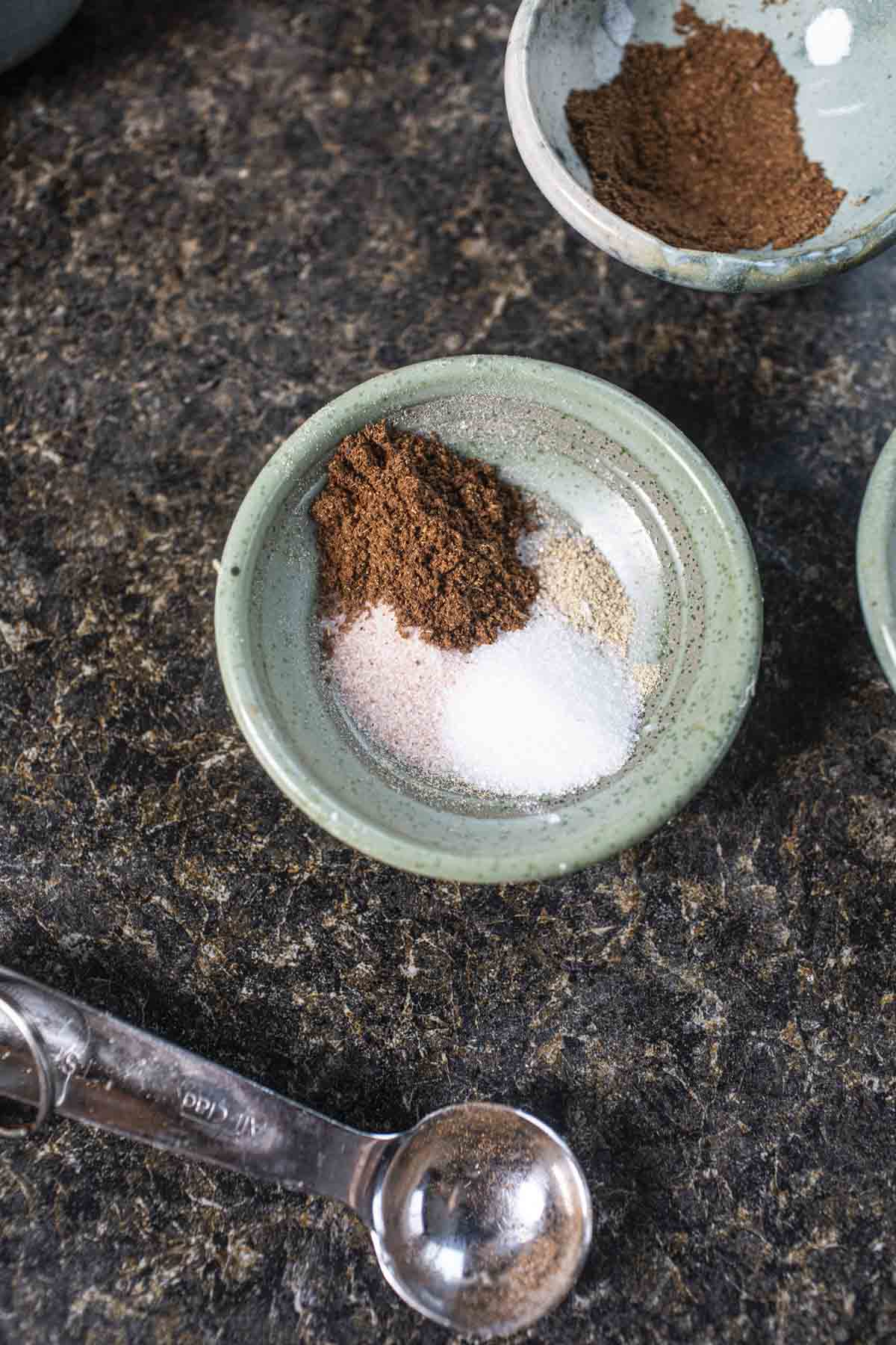 Spice blends in a bowl on the table. 