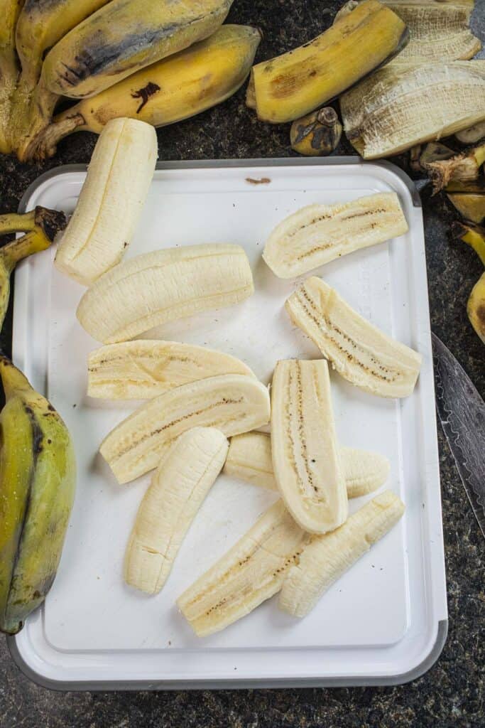 sliced bananas on a cutting board. 