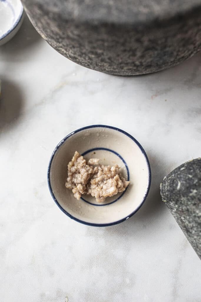 Ground pork in a small bowl. 