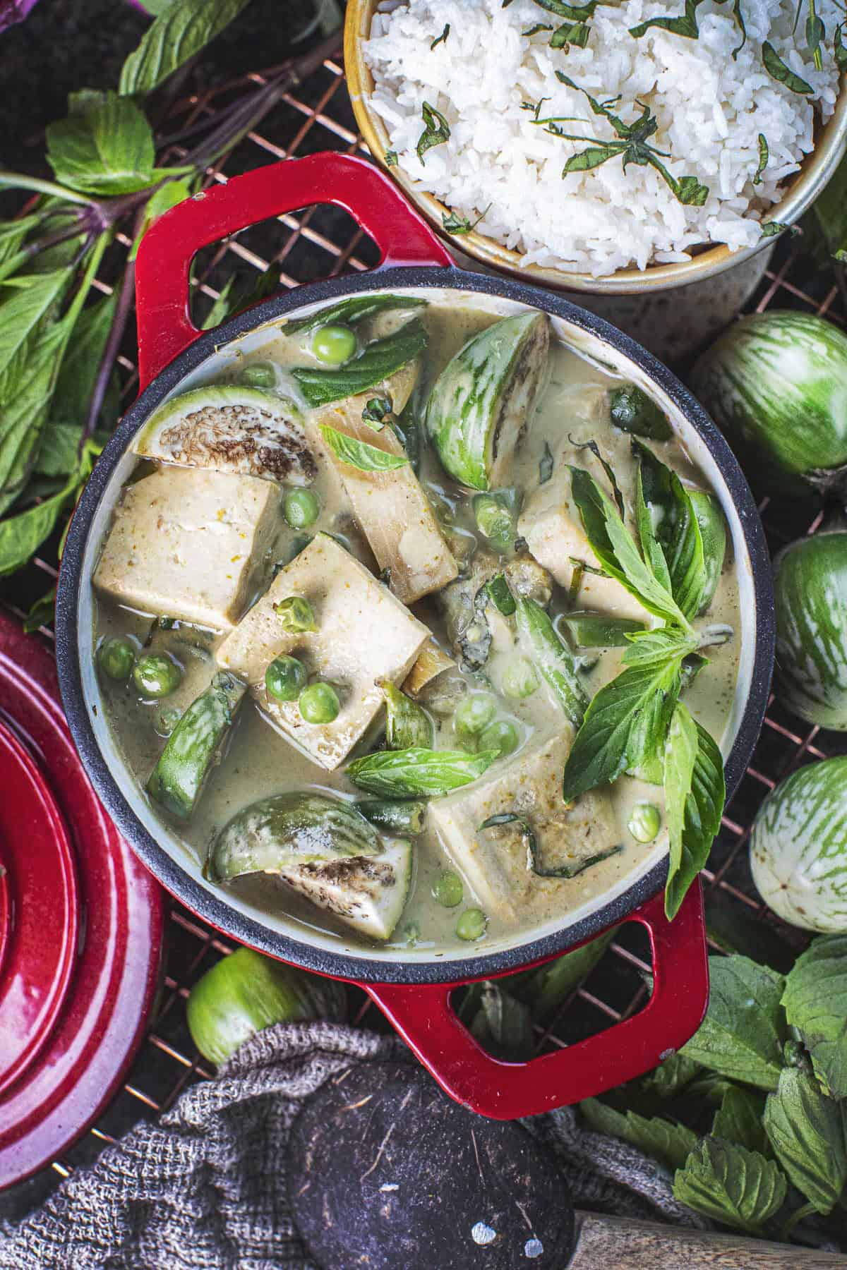 Green thai curry full of vegetables in a bowl. 