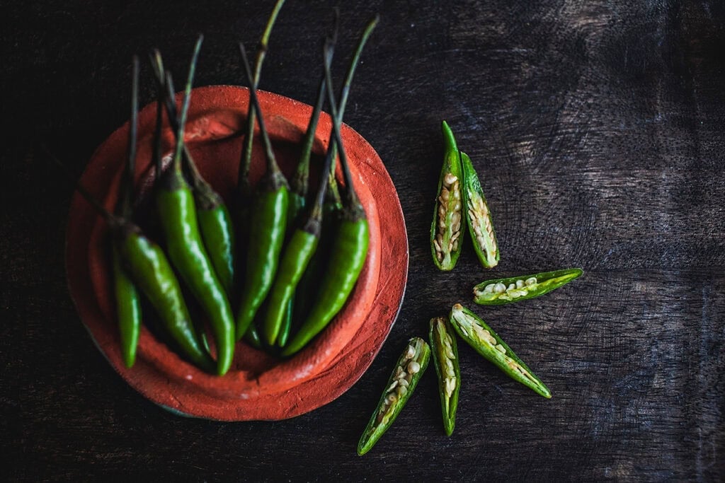 Thai jinda peppers in a bowl.