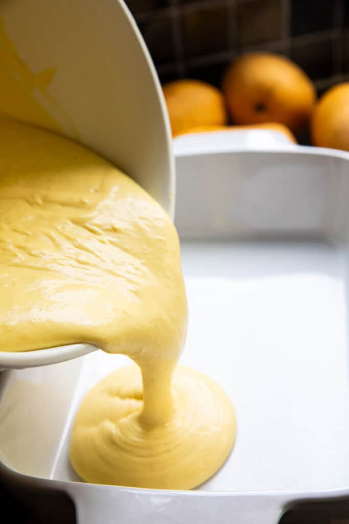 asian mango ice cream base in a bowl and poured into a shallow pan. 