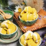 Asian mango ice cream in small bowls on the table.