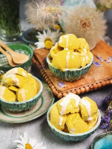 Asian mango ice cream in small bowls on the table.