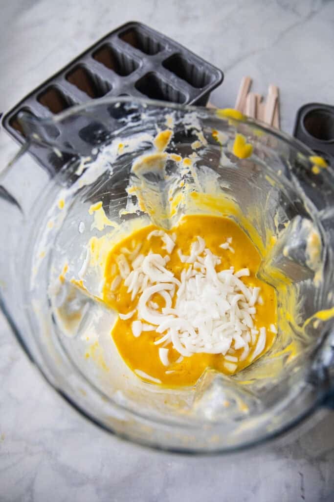 Puree mango with young coconut meat in a food processor. 