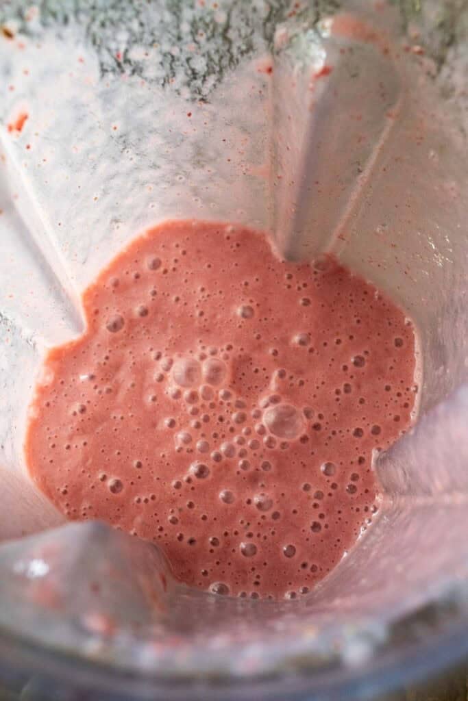 Strawberry puree in a food processor. 