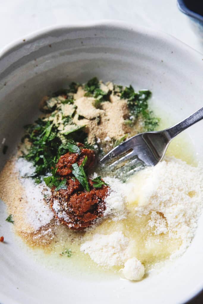 Tom yum paste ingredients for roasted acorn squash in a bowl. 