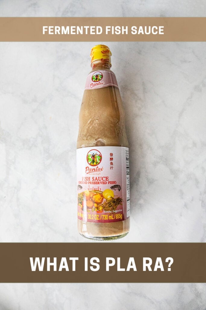 Pla Ra bottle on the table with a label.