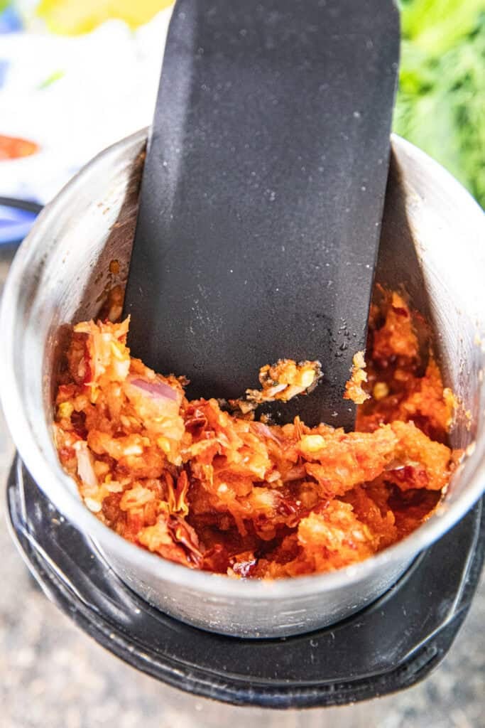 Chili paste for Gaeng Om Gai prepared in a spice grinder.