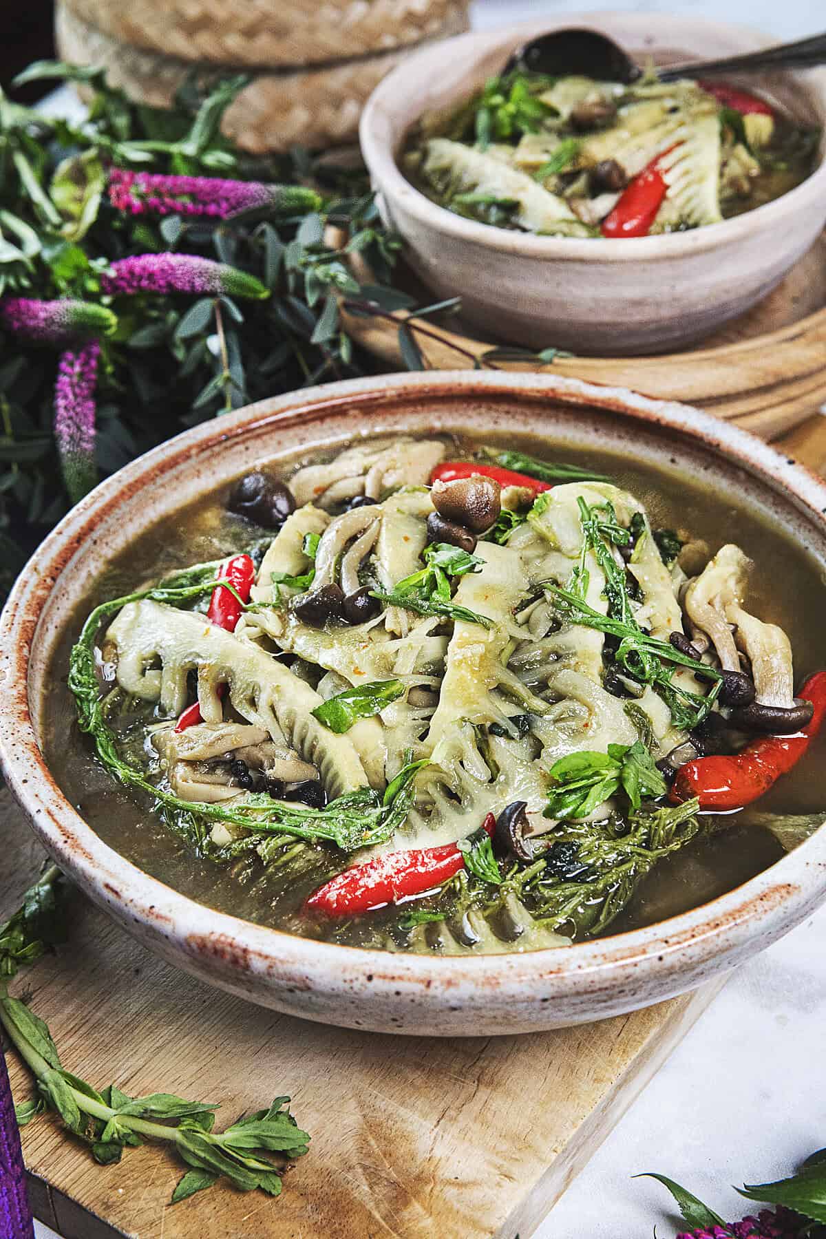 bamboo soup recipe in bowls on cutting board.