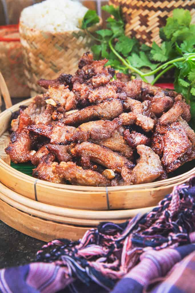 Close-up of golden brown crispy Moo Tod pork.