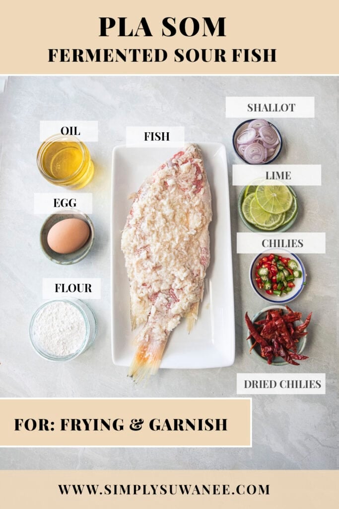 Ingredients for frying Pla Som including oil, egg, flour, shallots, lime, fresh chilies, and dried chilies.