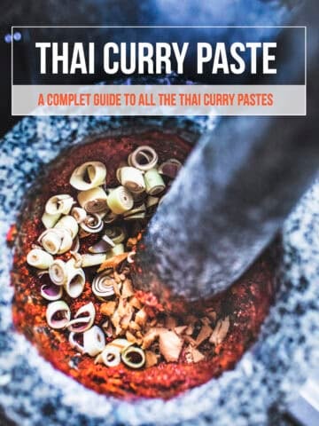 Different types of homemade Thai curry paste including red curry paste, green curry paste, yellow curry paste, and Massaman curry paste.