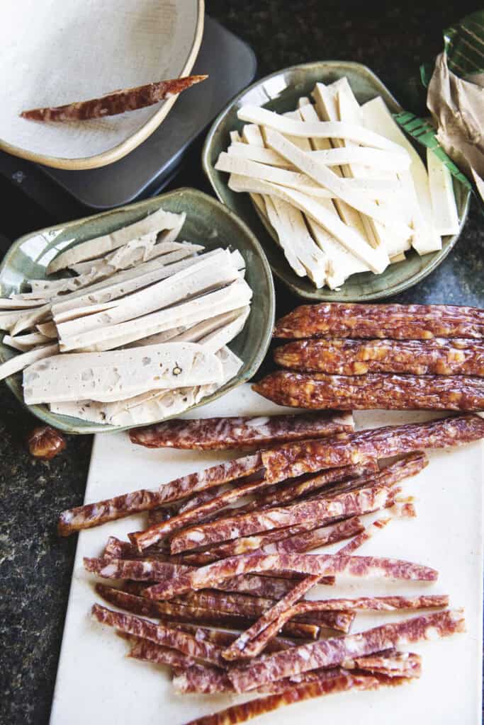 Sliced Chinese sausage, Moo Yor, and firm tofu for Poh Pia Sod.
