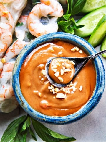 spicy Hoisin Peanut sauce in a small bowl for dipping.