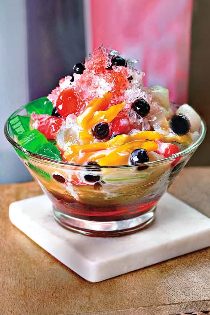 Nam Khaeng Sai with shaved ice, jackfruit, boba, colorful jellies, sala syrup and condensed milk.