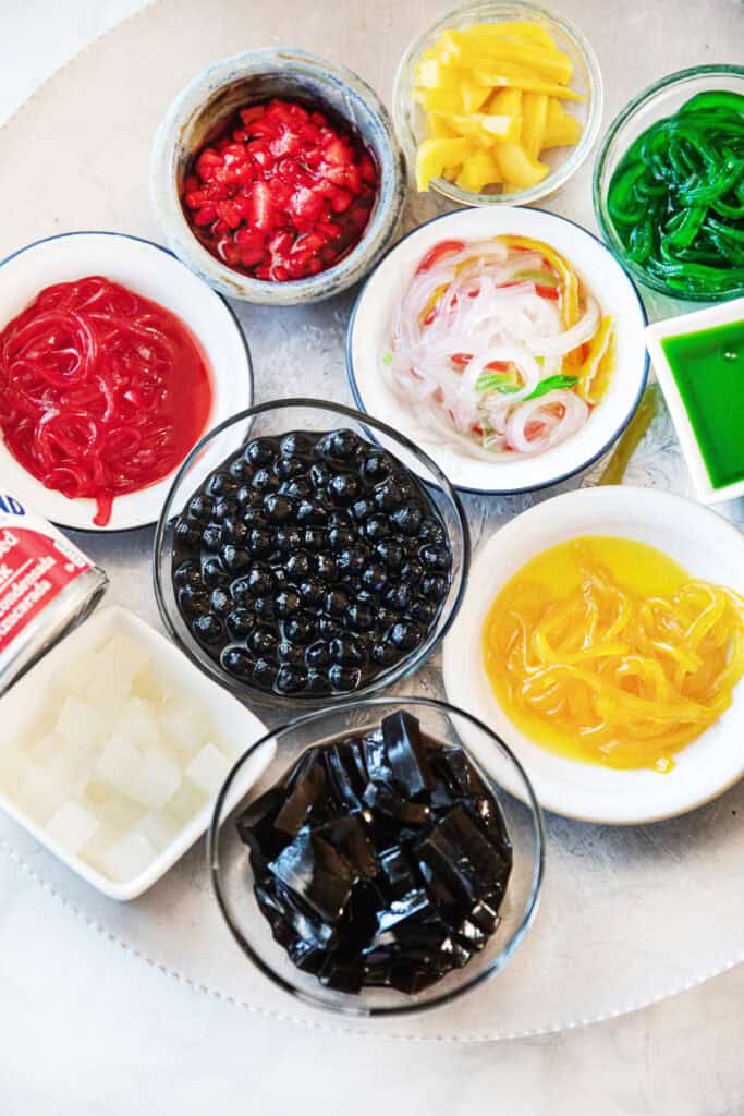 Colorful tapioca noodles and boba pearls for Thai shaved ice.