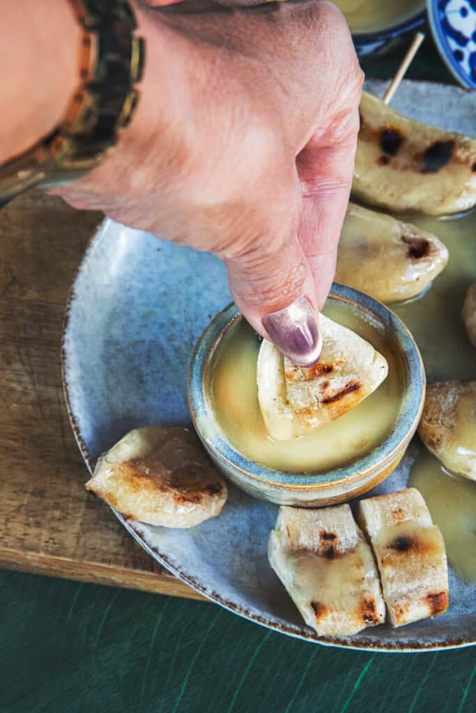 Thai grilled banana dipped in coconut palm sugar sauce.