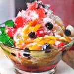 Nam Khaeng Sai with shaved ice, jackfruit, boba, colorful jellies, sala syrup and condensed milk.