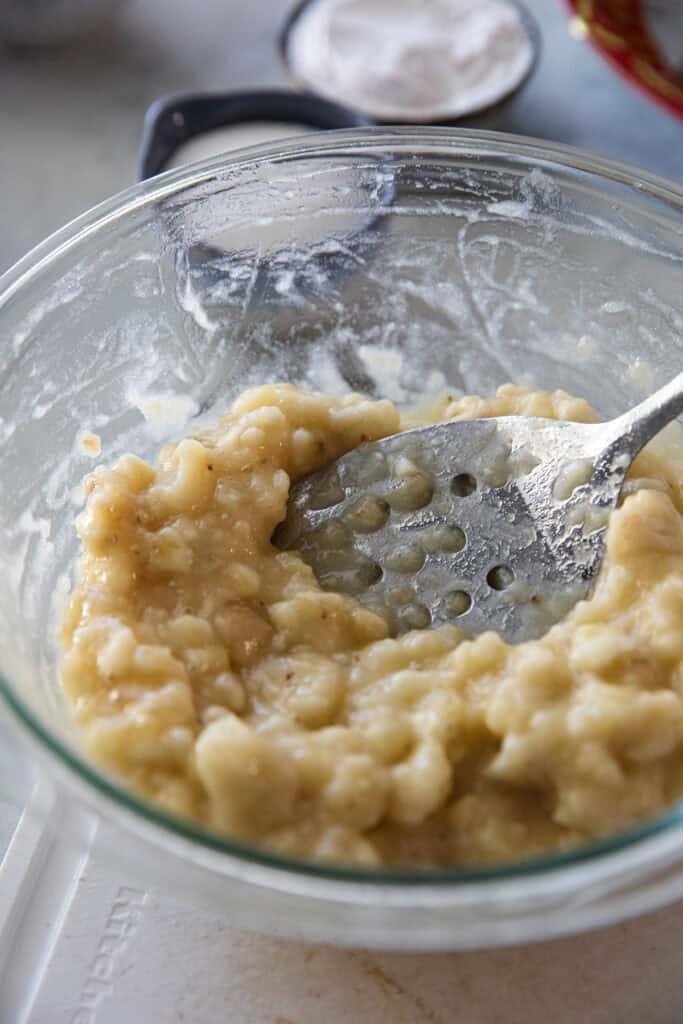 Very ripe Nam Wa bananas mashed for Khanom Kluay.