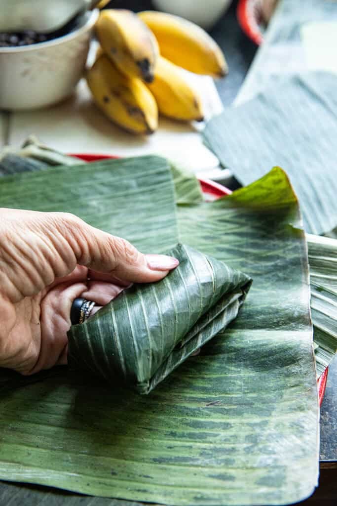 Homemade Khao Tom Mud wrapped in banana leaves.